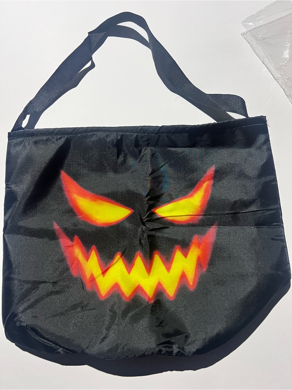 Black Halloween Pumpkin Face Messenger Bag with Fiery Graphic